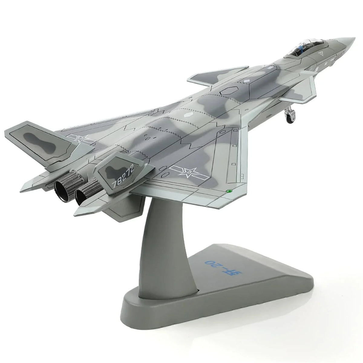 Scale model of a J-20 stealth fighter jet with camouflage paint on a display stand