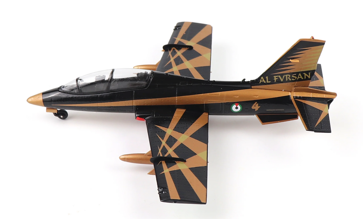 Scale model of an Aermacchi MB-339 jet trainer in black and gold Al Fursan livery