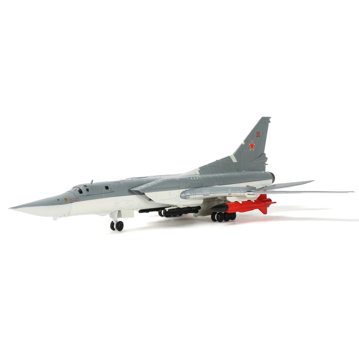 Detailed scale model of a Russian Tu-22M3 Backfire bomber with red missiles