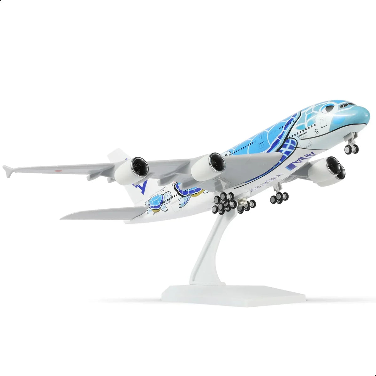 ANA Flying Honu A380 model airplane with blue sea turtle livery on a white display stand