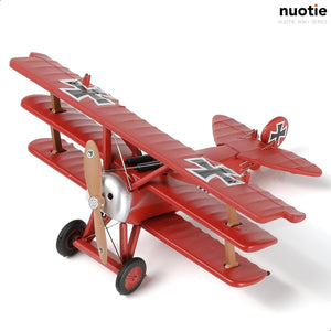 NUOTIE Model Fokker Dr.I red aircraft angled view showcasing propeller and wings