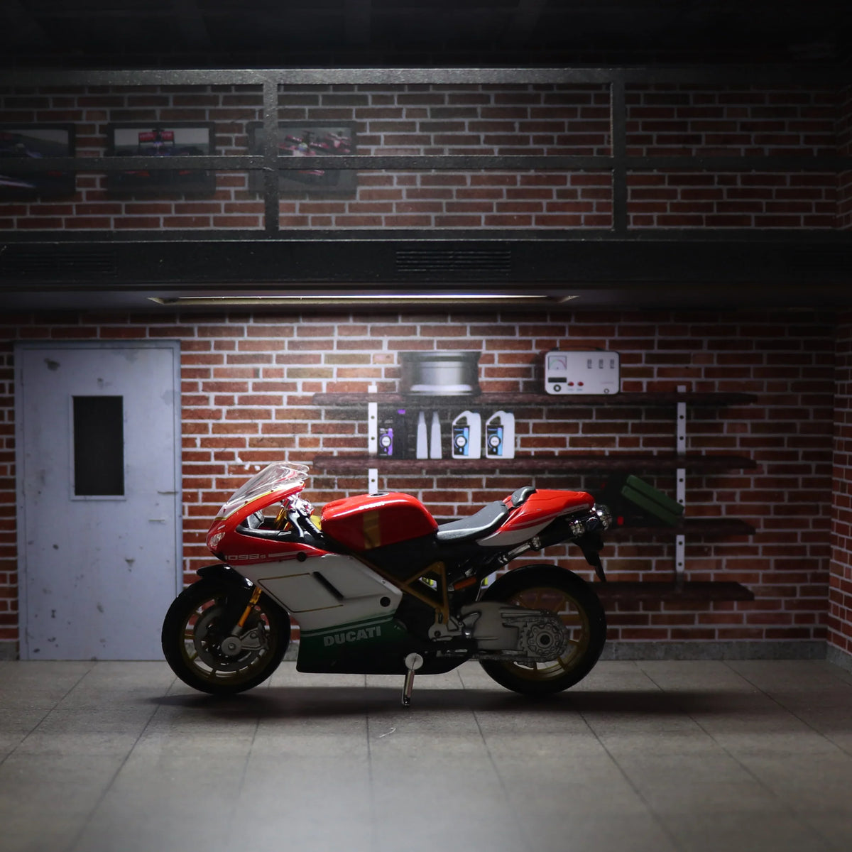 Maisto 1:18 die-cast Ducati 1098S motorcycle scale model side profile in garage setting