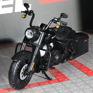 Maisto 1:12 Harley Davidson Road King Special diecast motorcycle model displayed on a patterned surface.