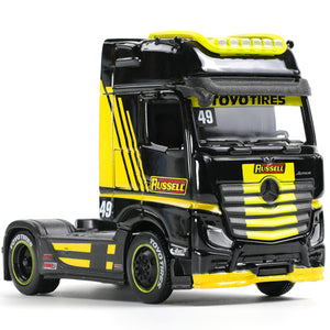 Front view of a 1:64 die-cast Mercedes-Benz Actros 1851 semi truck model highlighting the brand logo.