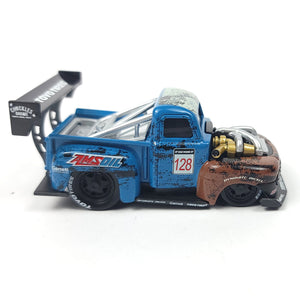 Side view of the 1949 Ford F1 Pickup Truck model highlighting the blue and brown color scheme.