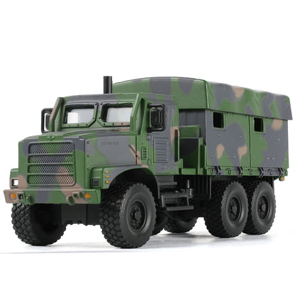 1:64 scale model of a USMC MTVR MK23 military truck in green camouflage with detailed features.