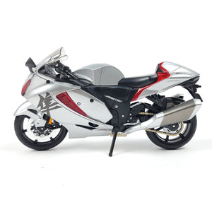 Side view of the silver and red Suzuki Hayabusa GSX1300R motorcycle model highlighting its design.