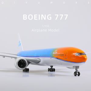 QIYUMOKE Boeing 777-300ER model, front view showcasing the orange pride livery