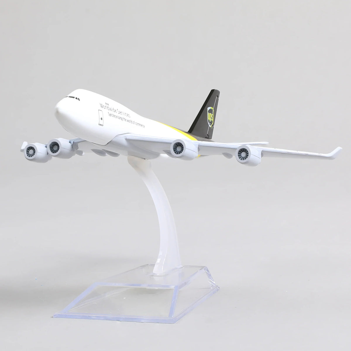 QIYUMOKE Boeing 747 UPS cargo plane diecast model side view on display stand