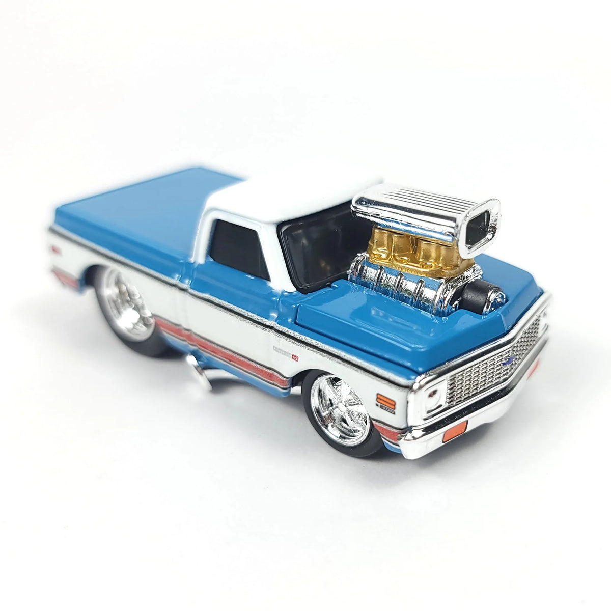Die-cast 1972 Chevrolet C10 pickup truck model in blue and white with chrome details and a supercharger.