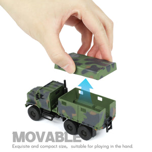Hand demonstrating the removable top of the 1:64 scale military truck model in green camouflage.