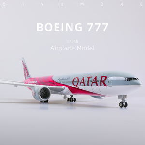 QIYUMOKE Boeing 777-300ER Qatar Airways diecast model, front view with display stand