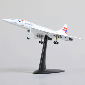 QIYUMOKE 1:200 Aerospatiale/BAC Concorde diecast model aircraft in British Airways livery, side profile view on a stand.