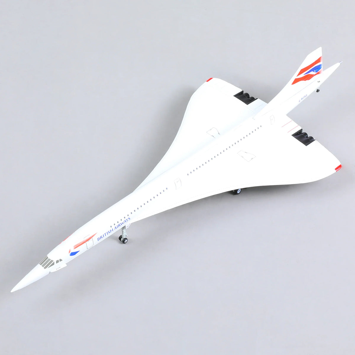 QIYUMOKE Aerospatiale/BAC Concorde model with British Airways livery, top view on stand