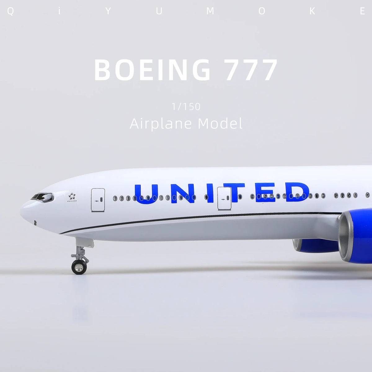 QIYUMOKE Boeing 777-300ER airplane model in front view