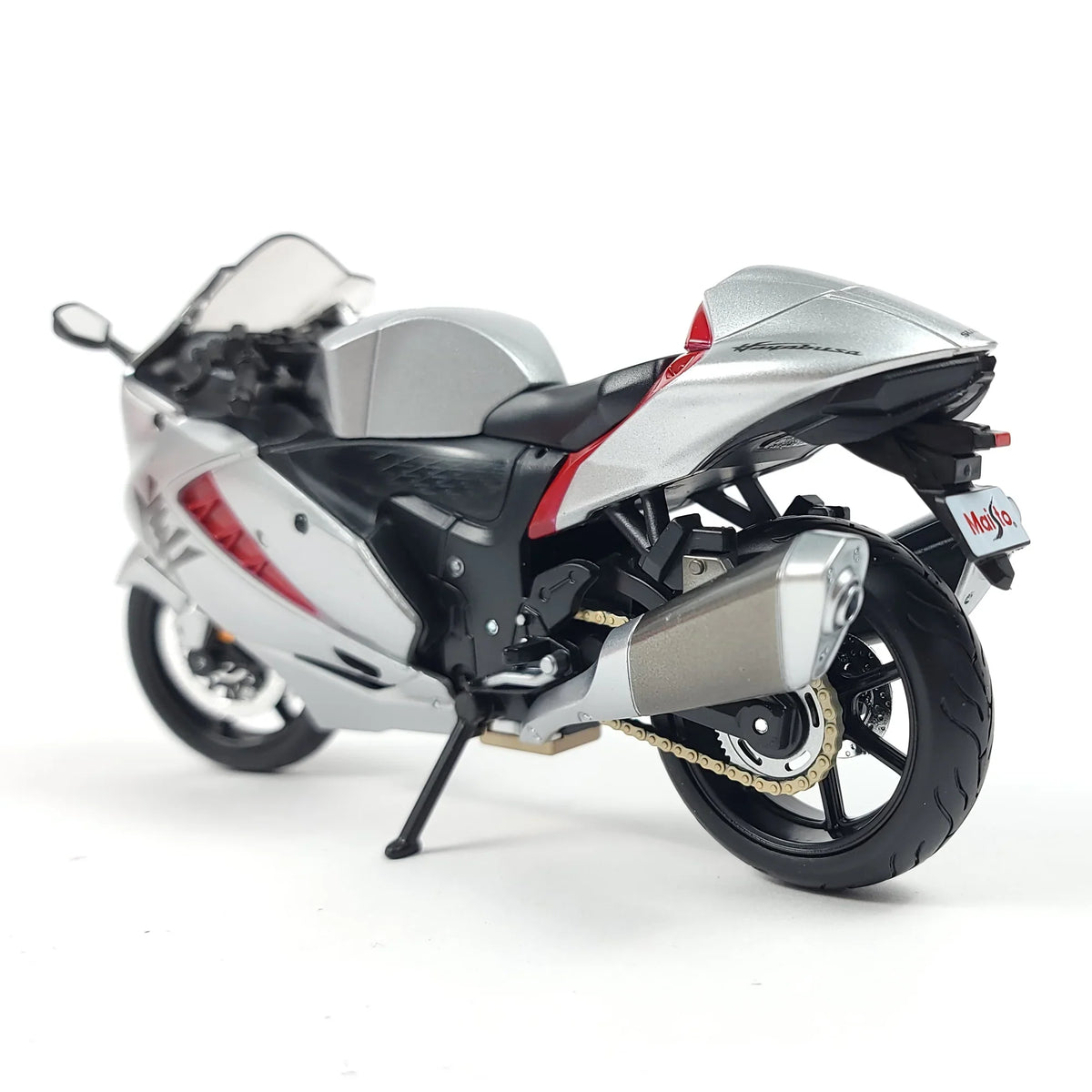 Rear view of the die-cast Suzuki Hayabusa GSX1300R motorcycle model highlighting the exhaust and details.
