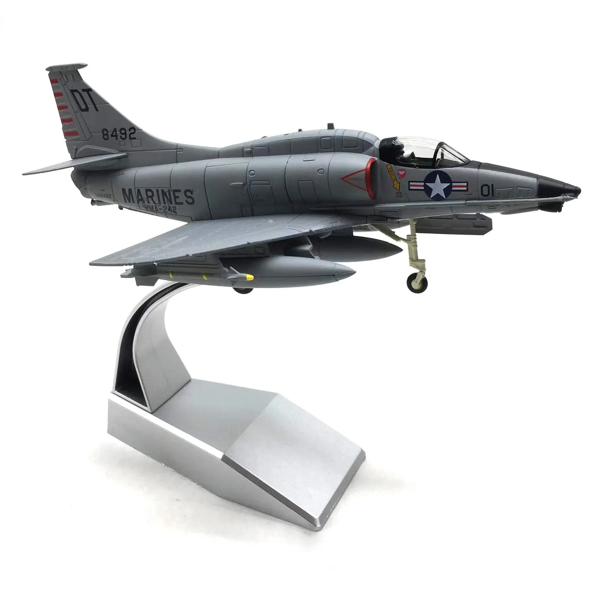 NUOTIE A-4 Skyhawk model in gray with US Marine Corps markings, front view on stand