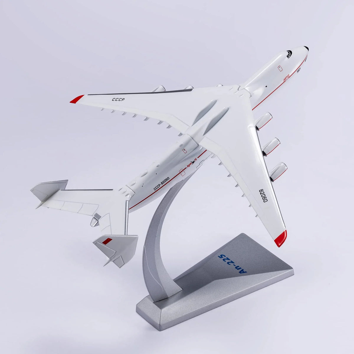 QIYUMOKE Antonov AN-225 Mriya diecast model displayed on stand, angled view