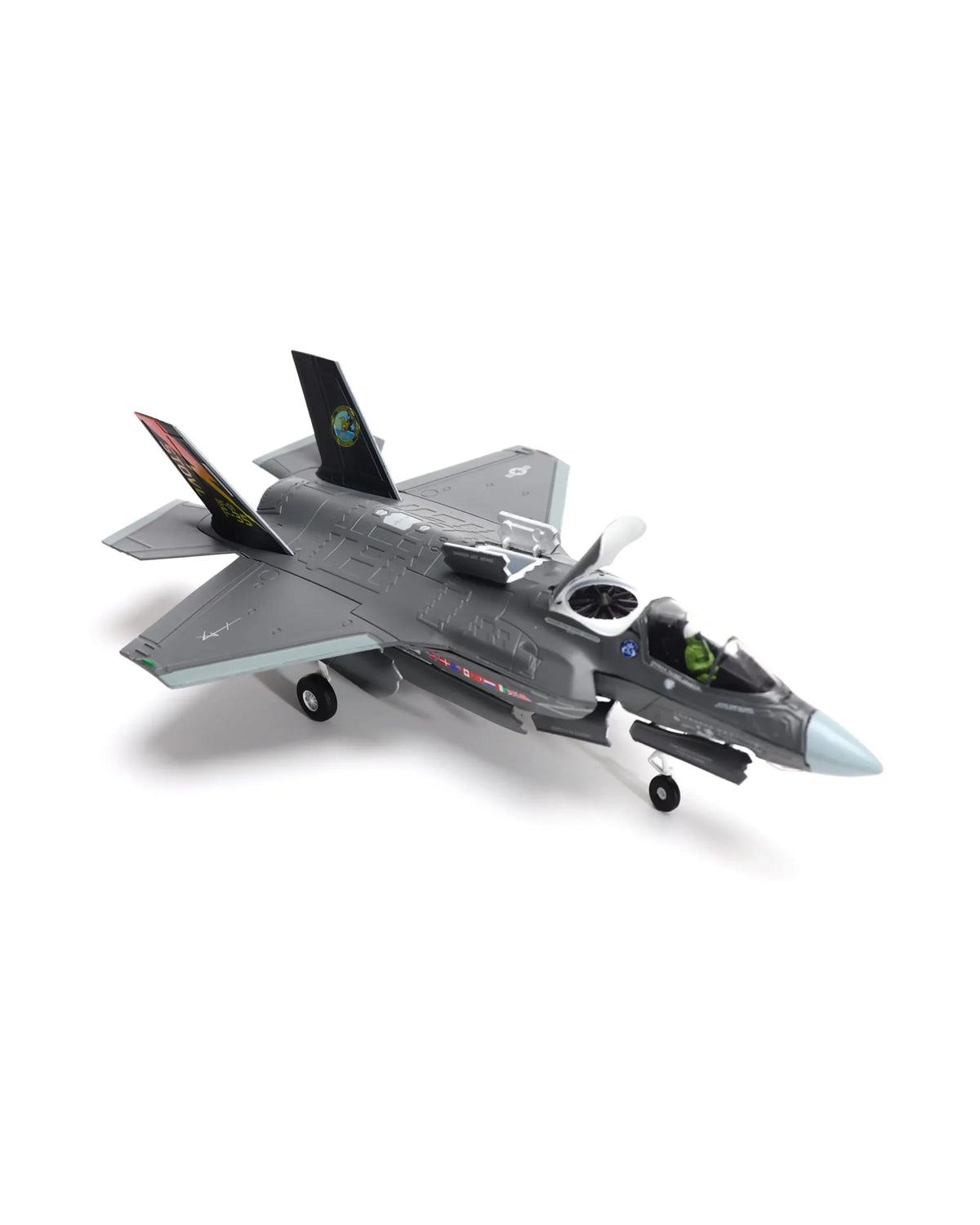 NUOTIE Model F-35B Lightning II diecast metal model aircraft in gray with stand, top view.