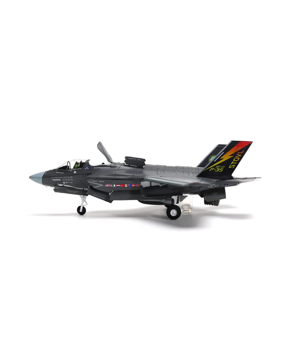 NUOTIE Model F-35B Lightning II diecast metal model aircraft in gray with stand, side profile.