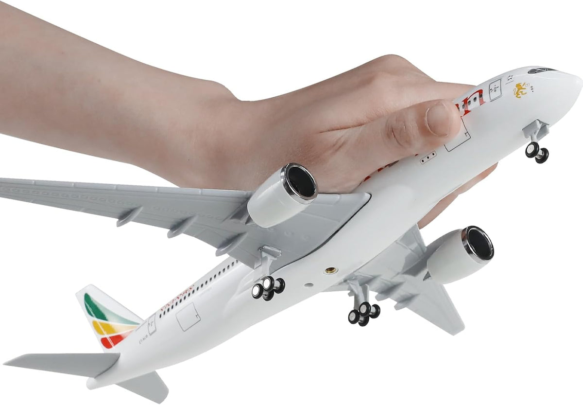 QIYUMOKE 1/240 Ethiopian A350 model with landing gear held in hand