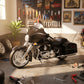 Maisto 2015 Street Glide Special motorcycle toy in black, displayed in a workshop setting