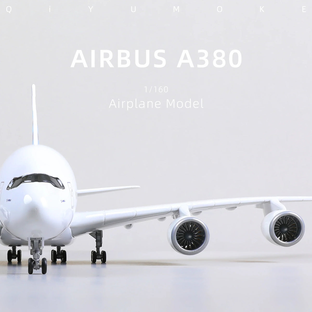 QIYUMOKE Airbus A380 diecast model with front view highlighting engines and fuselage