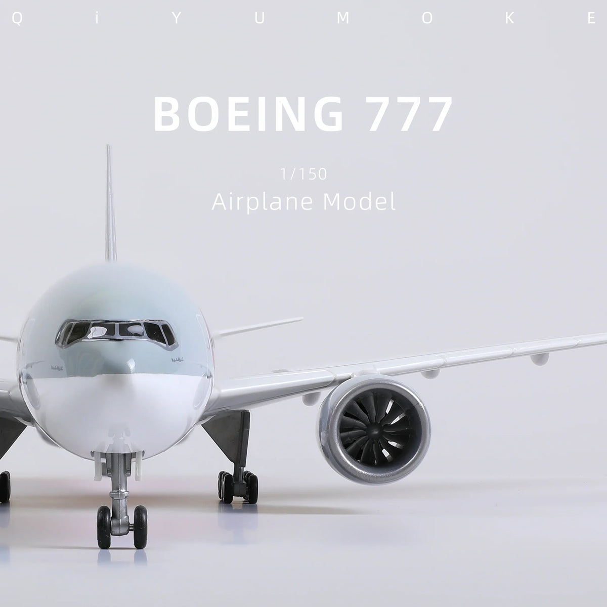 QIYUMOKE 1/150 Boeing 777-300ER Qatar Airways model, front view showing cockpit and engine detail