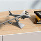 NUOTIE Boeing B-52 Stratofortress model displayed on a table with books
