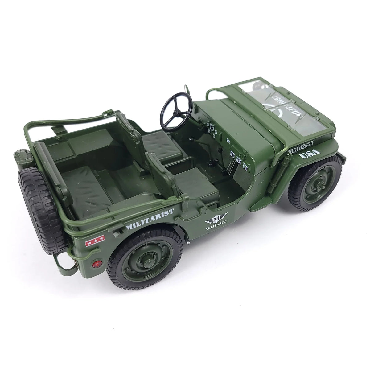 Top view of a green die-cast Willys military jeep model showing the interior and dashboard.