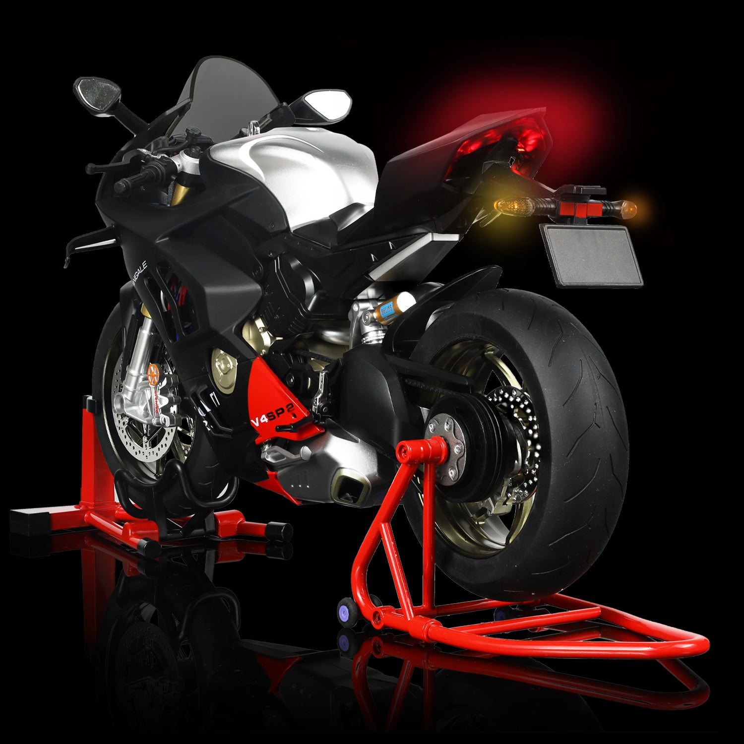 Ducati Panigale V4 SP2 motorcycle model displayed on a red stand with a black background.