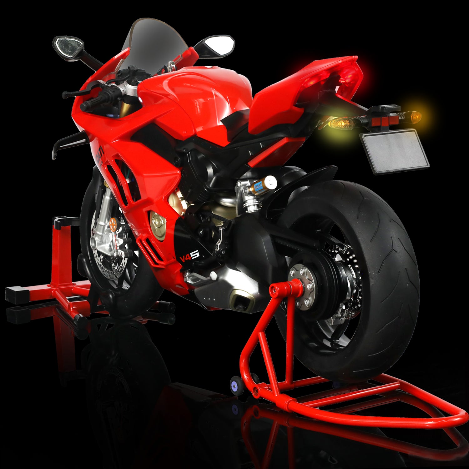 Ducati Panigale V4 SP2 motorcycle model in red with a black stand, showcasing rear view and details.
