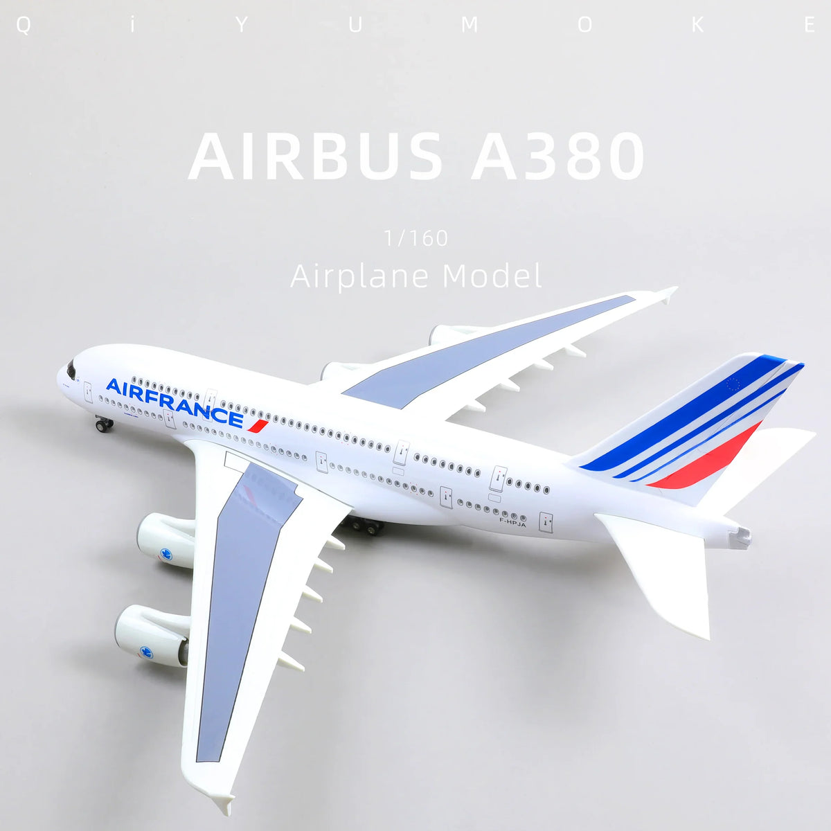 QIYUMOKE Airbus A380 airplane model in white with blue and red accents, top view