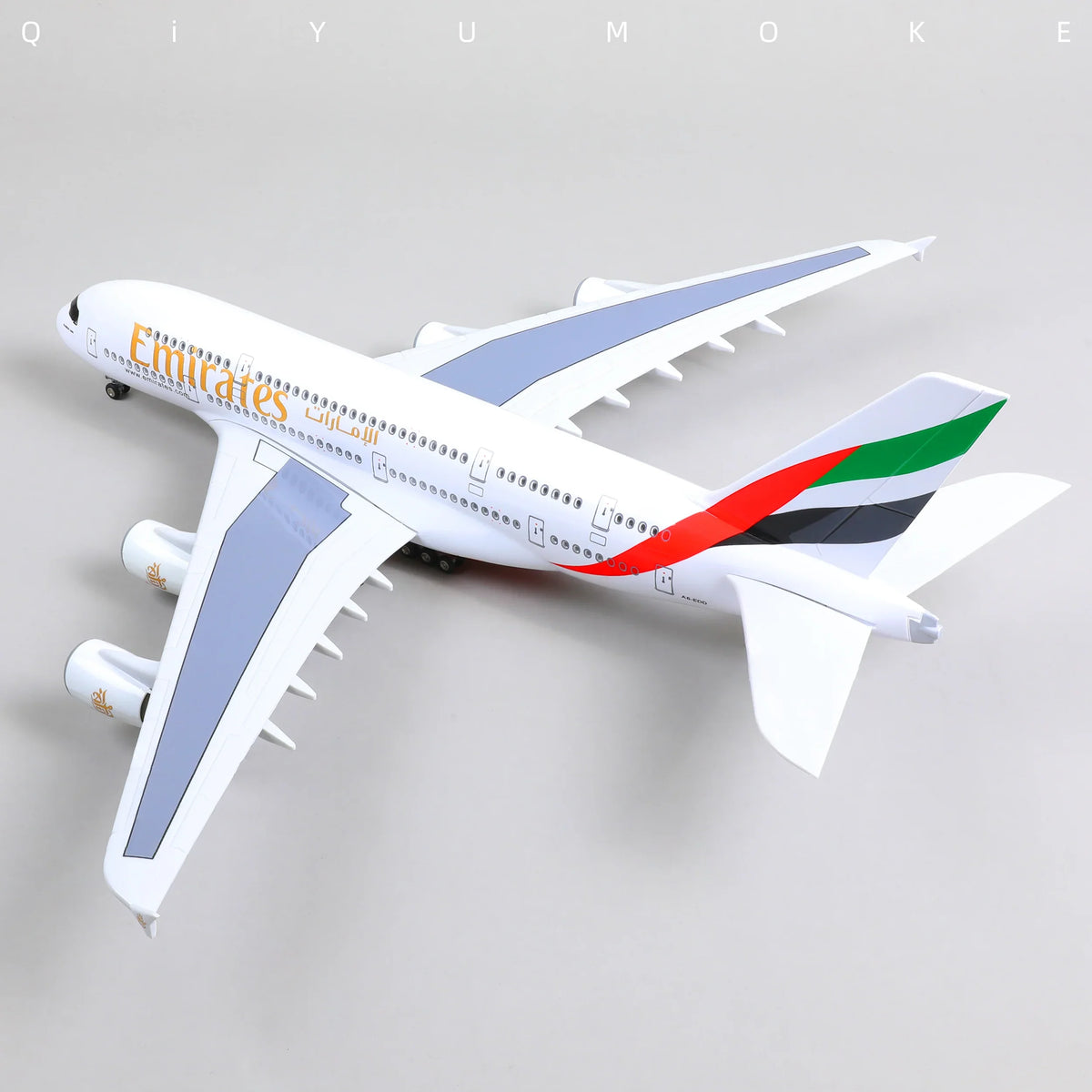 QIYUMOKE Airbus A380 Emirates model in white with red and green accents, top view