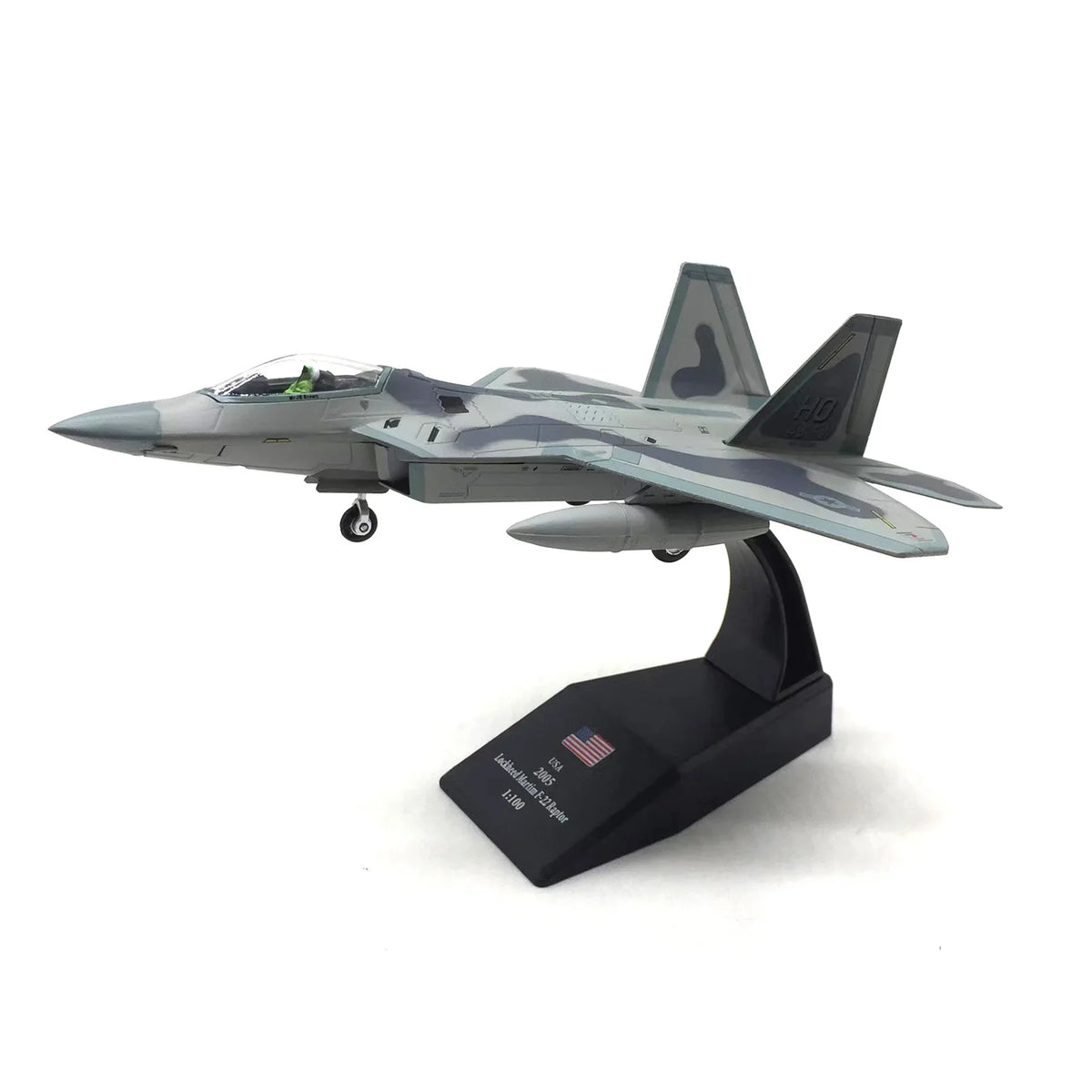 NUOTIE F-22 Raptor diecast model aircraft in gray camouflage with stand, front view