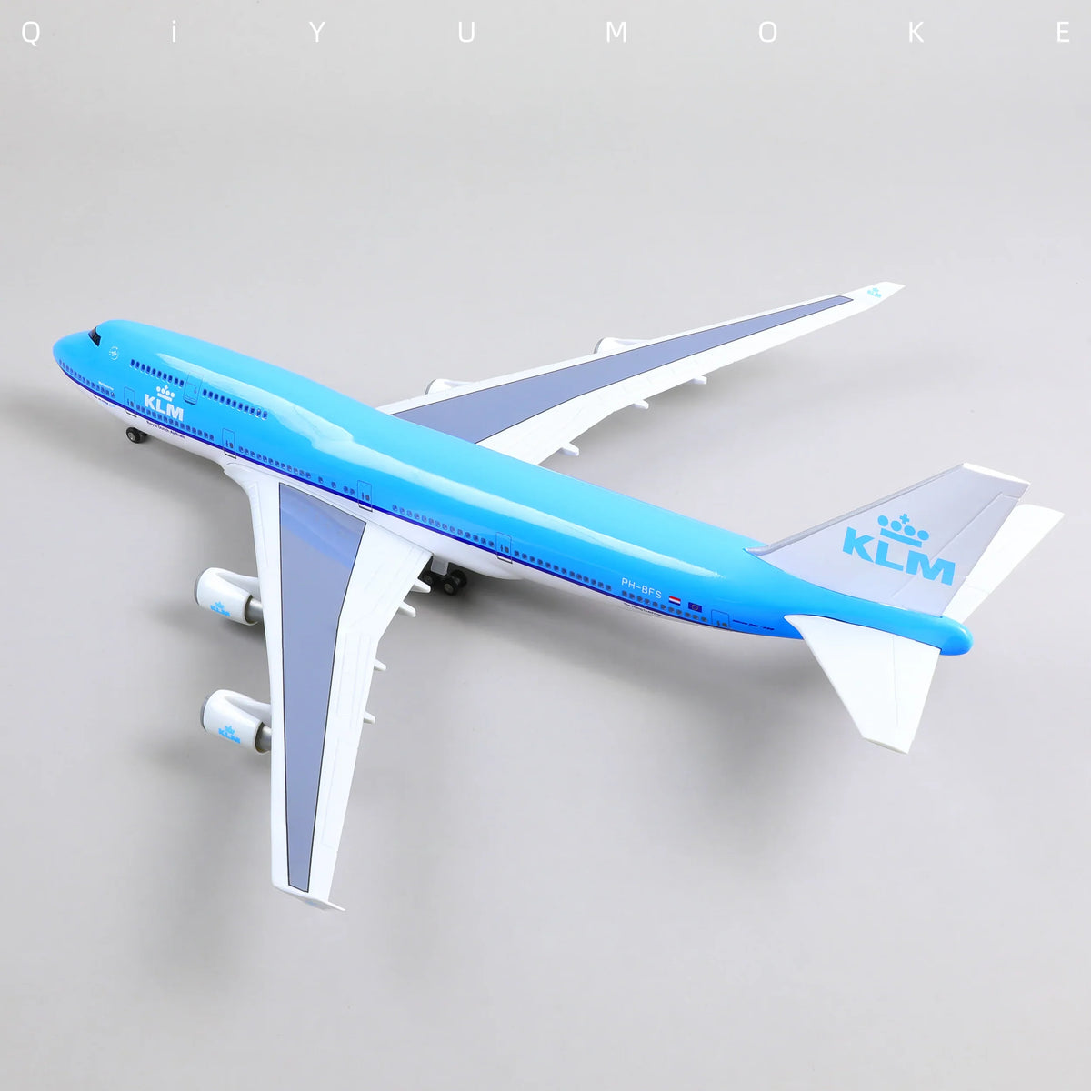 QIYUMOKE 1/160 Boeing 747 KLM diecast airplane model in blue and white, top view.