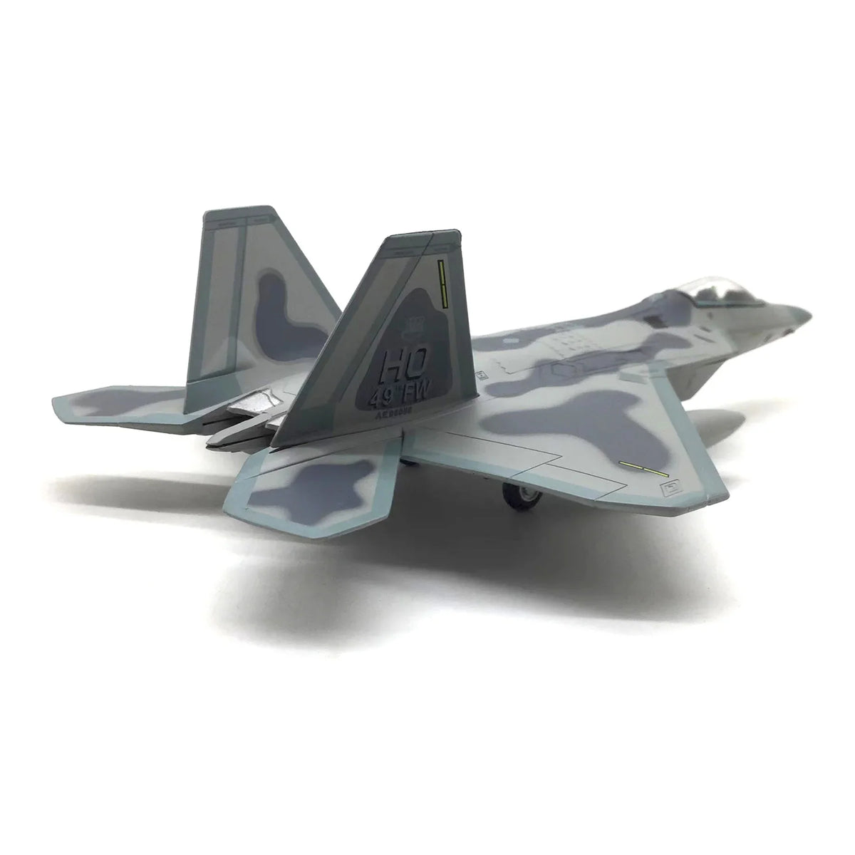NUOTIE F-22 Raptor diecast model aircraft in gray camouflage, rear view
