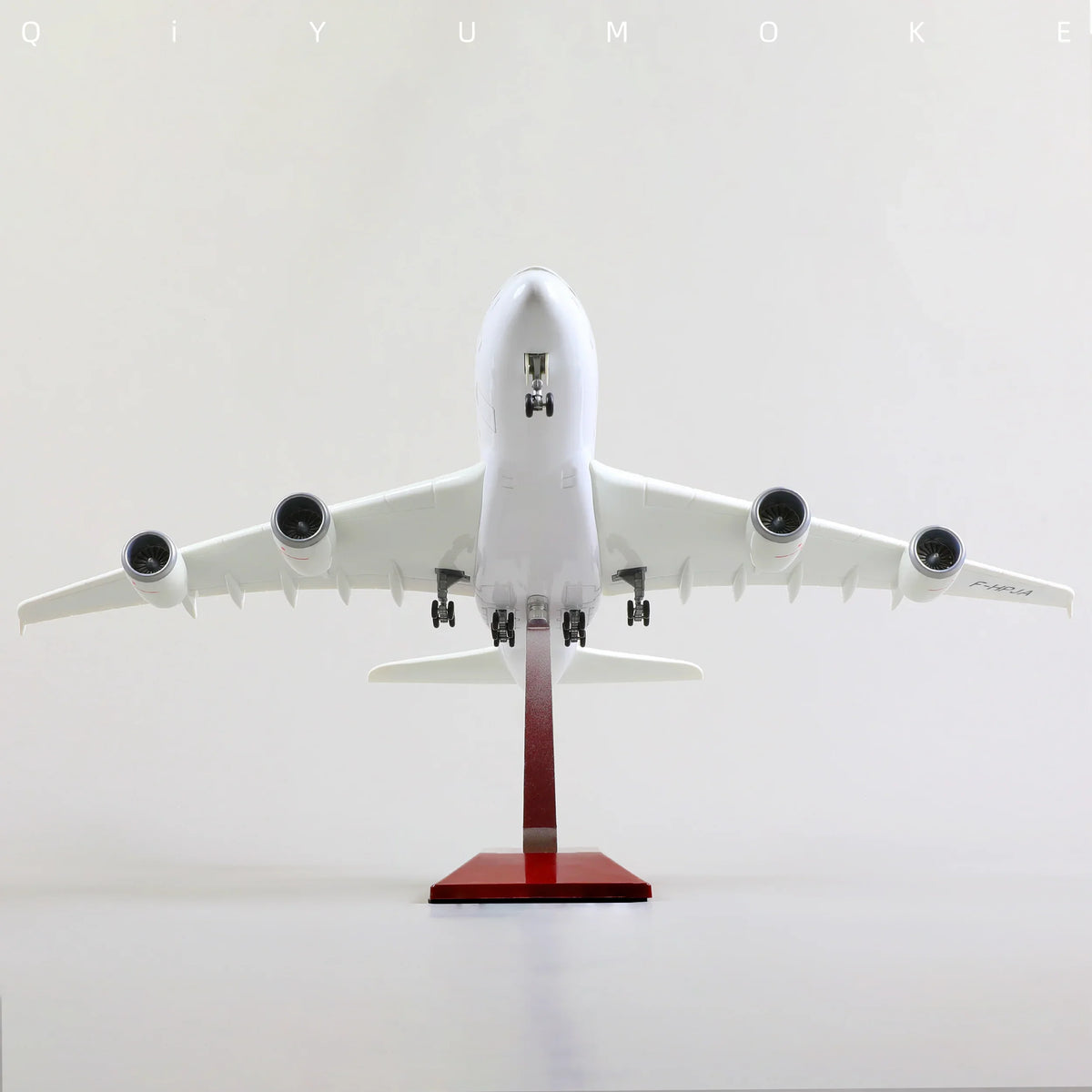 QIYUMOKE Airbus A380 airplane model in white, front view with stand