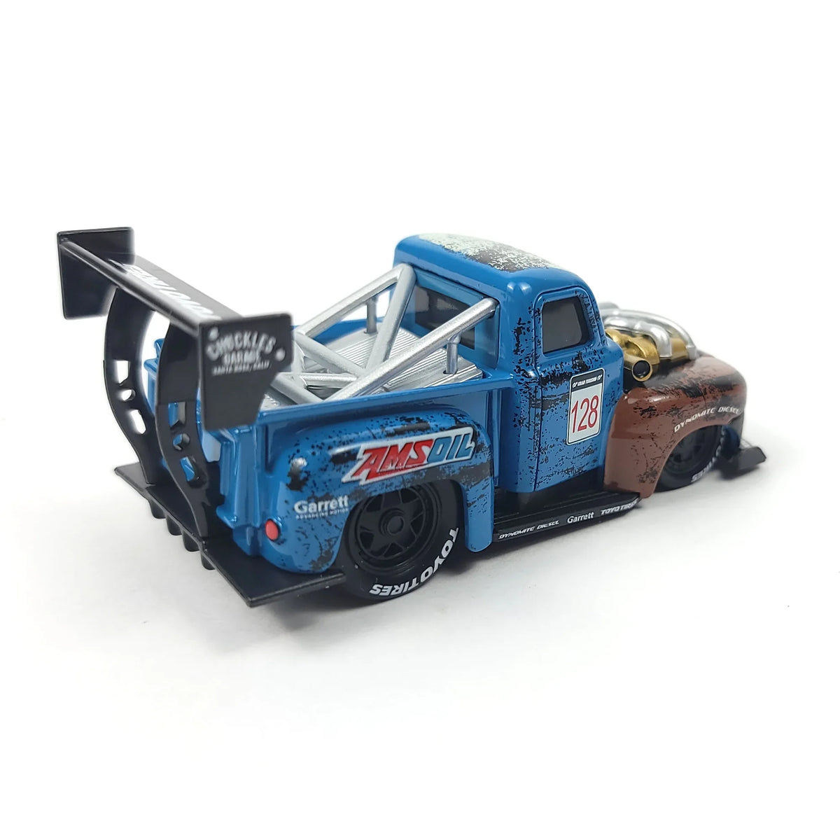 Side view of the 1949 Ford F1 pickup truck model highlighting the racing features and details.