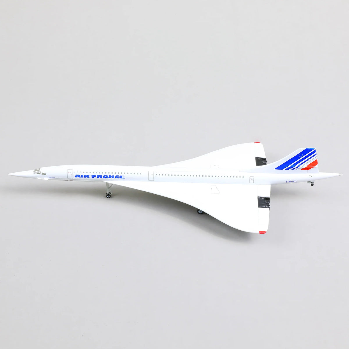 QIYUMOKE Concorde Air France diecast airplane model in white, flat top view on display stand
