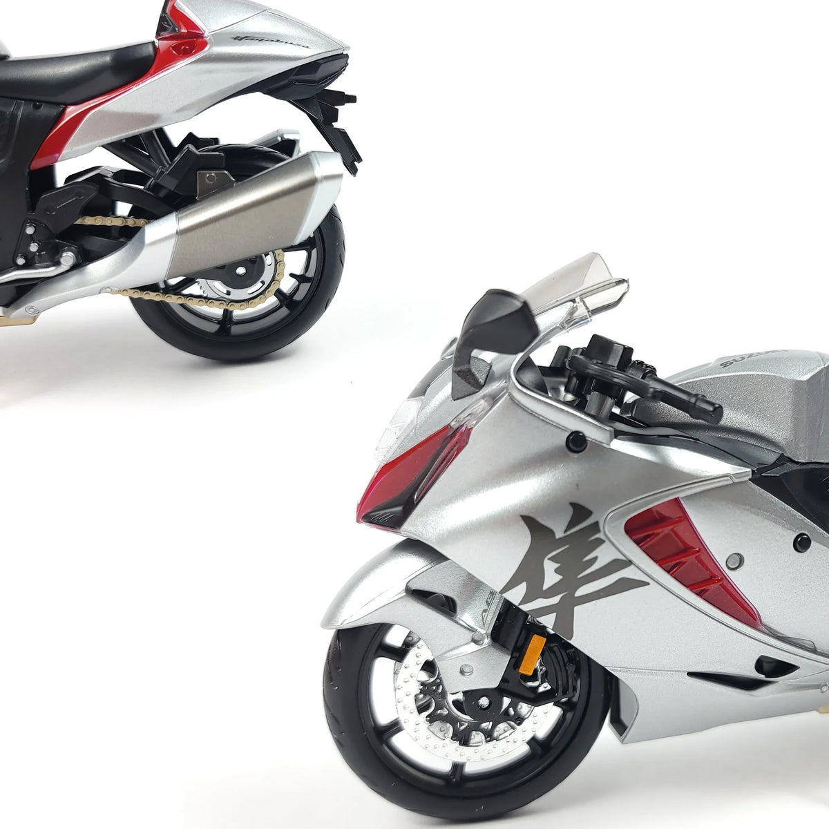 Detailed 1:12 scale model of a Suzuki Hayabusa GSX1300R motorcycle by Maisto, showcasing silver and red design.