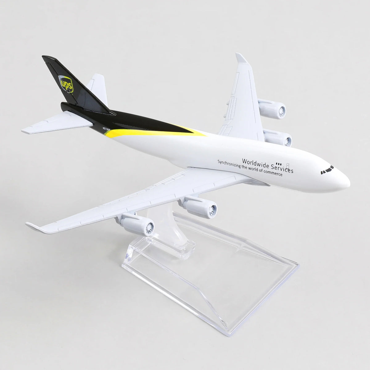 QIYUMOKE 1:400 Boeing 747 UPS cargo plane diecast model angled side view