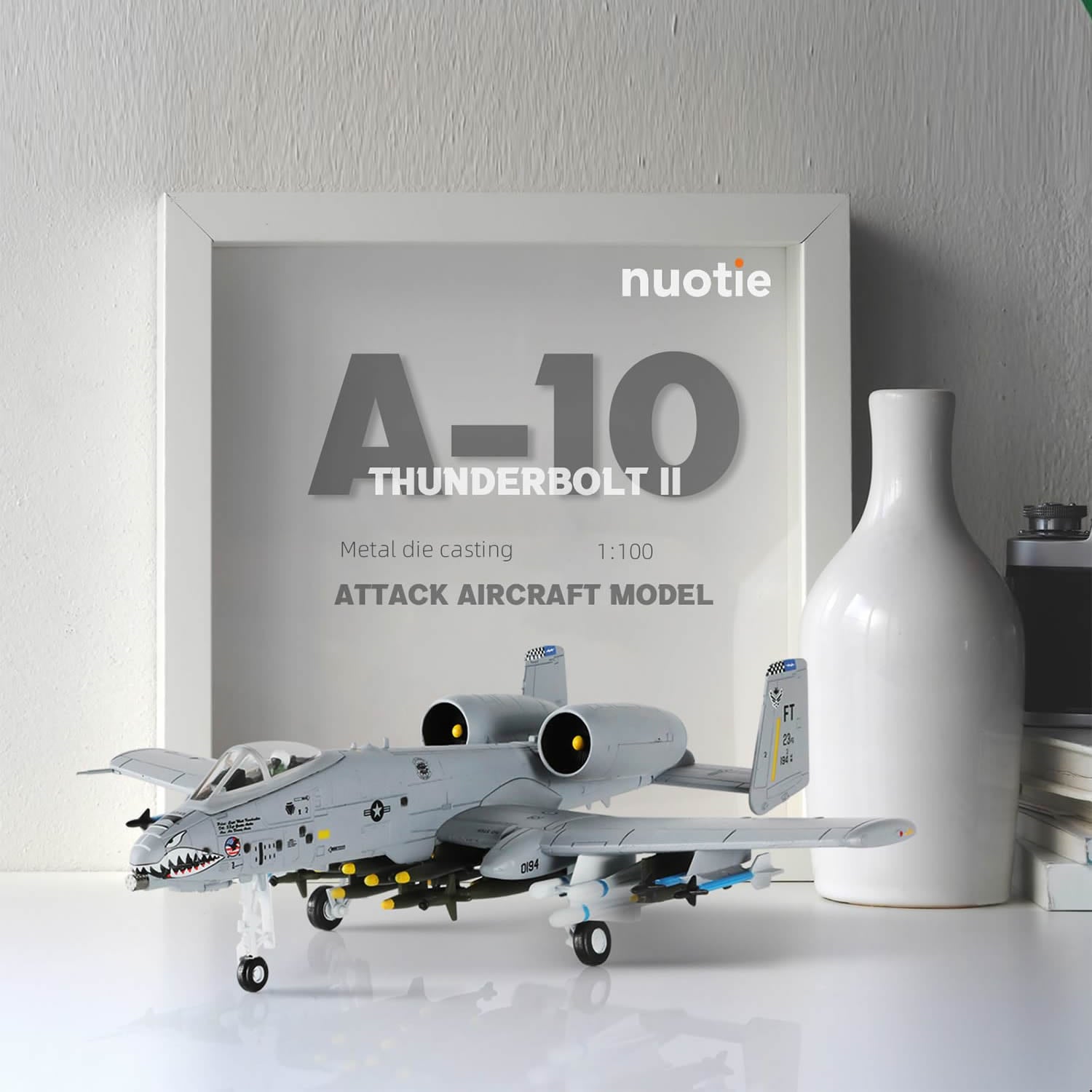 NUOTIE Model A-10 Thunderbolt II diecast aircraft on display with a frame in background