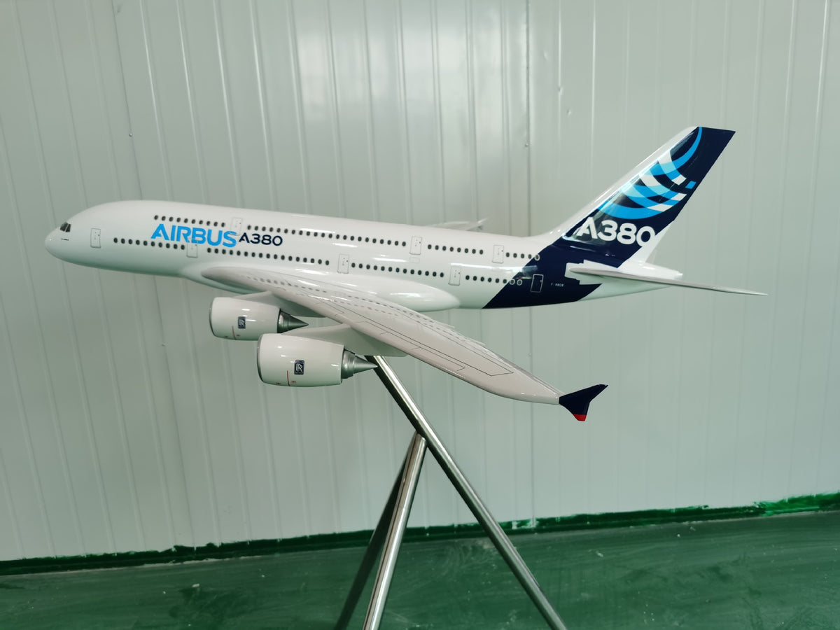 QIYUMOKE Airbus A380 passenger jet aircraft model on a display stand