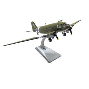 NUOTIE Model Douglas C-47 Skytrain diecast metal model aircraft in green with stripes, angled view on display stand