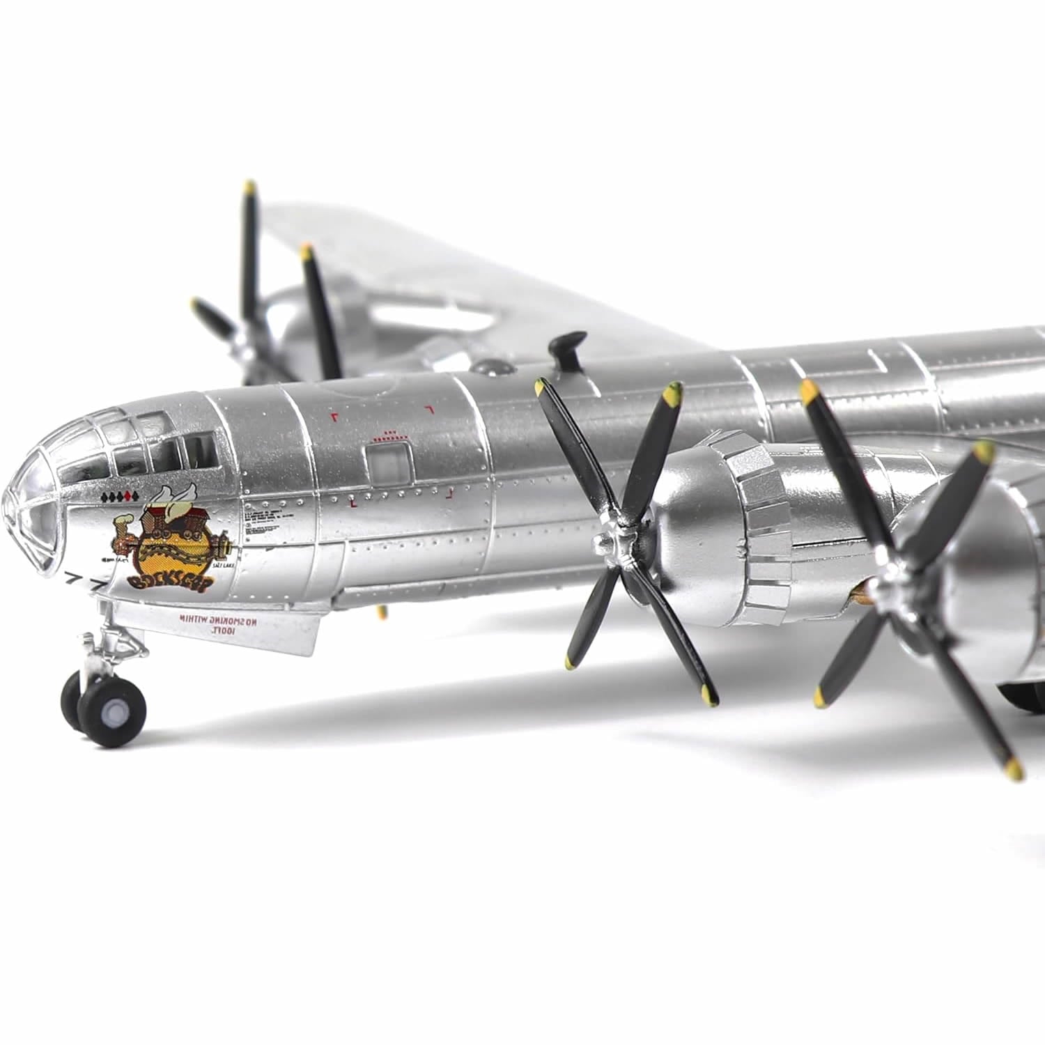 AF1 B-29 Superfortress diecast model showcasing nose art and propellers, side view