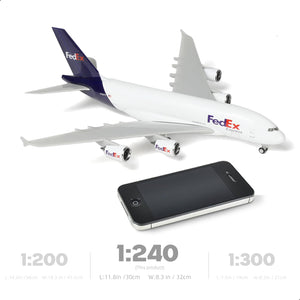 QIYUMOKE FedEx Express Airbus A380 model next to smartphone for scale, aircraft in stationary position