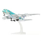 QIYUMOKE 1/300 ANA Airbus A380 green diecast model aircraft on stand, side profile view