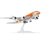 QIYUMOKE 1/240 ANA Flying Honu aircraft model in orange and brown, side profile