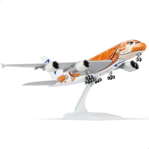 QIYUMOKE 1/240 ANA Flying Honu aircraft model in orange and brown, side profile
